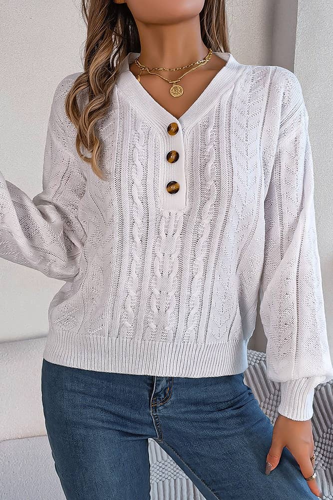 Pull en maille torsadée à col V boutonné