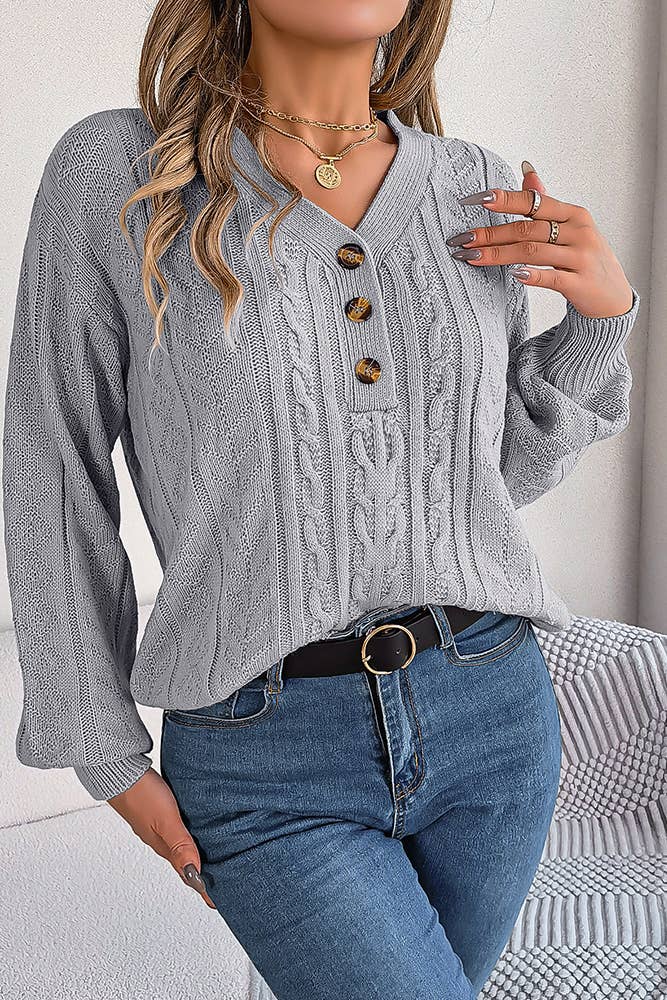 Pull en maille torsadée à col V boutonné