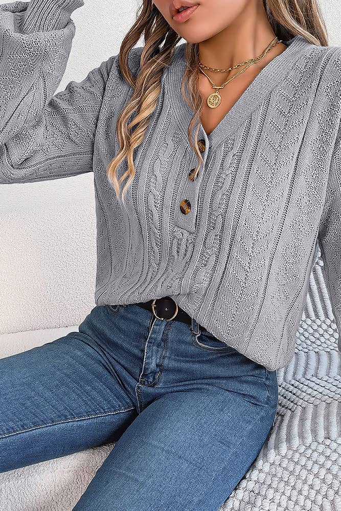 Pull en maille torsadée à col V boutonné