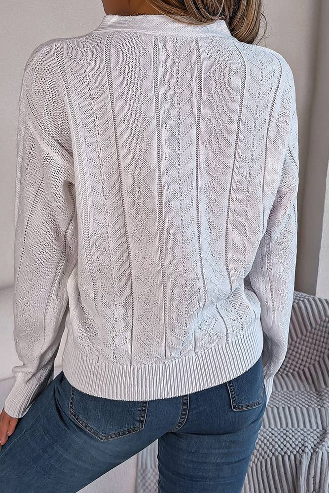Pull en maille torsadée à col V boutonné