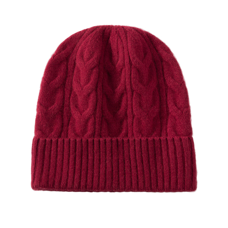 Bonnet tricoté à torsades